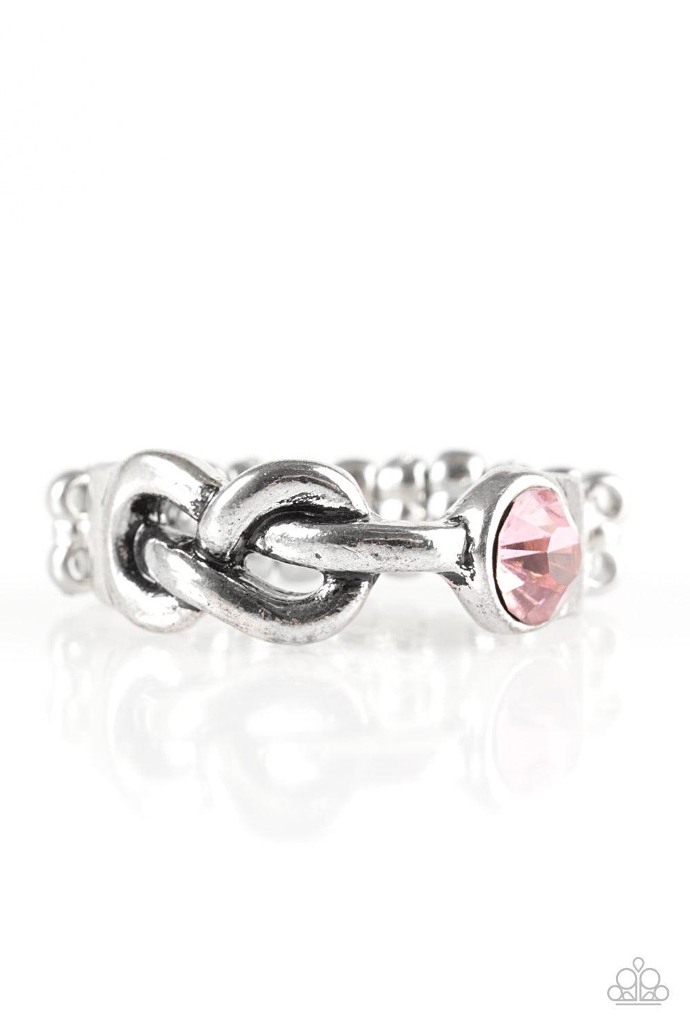 Paparazzi Accessories Infinite POSH-ibilities - Pink Dotted with a glittery pink rhinestone, a shiny silver bar loops into a whimsical infinity symbol across the finger, creating a dainty band. Features a dainty stretchy band for a flexible fit. Jewelry