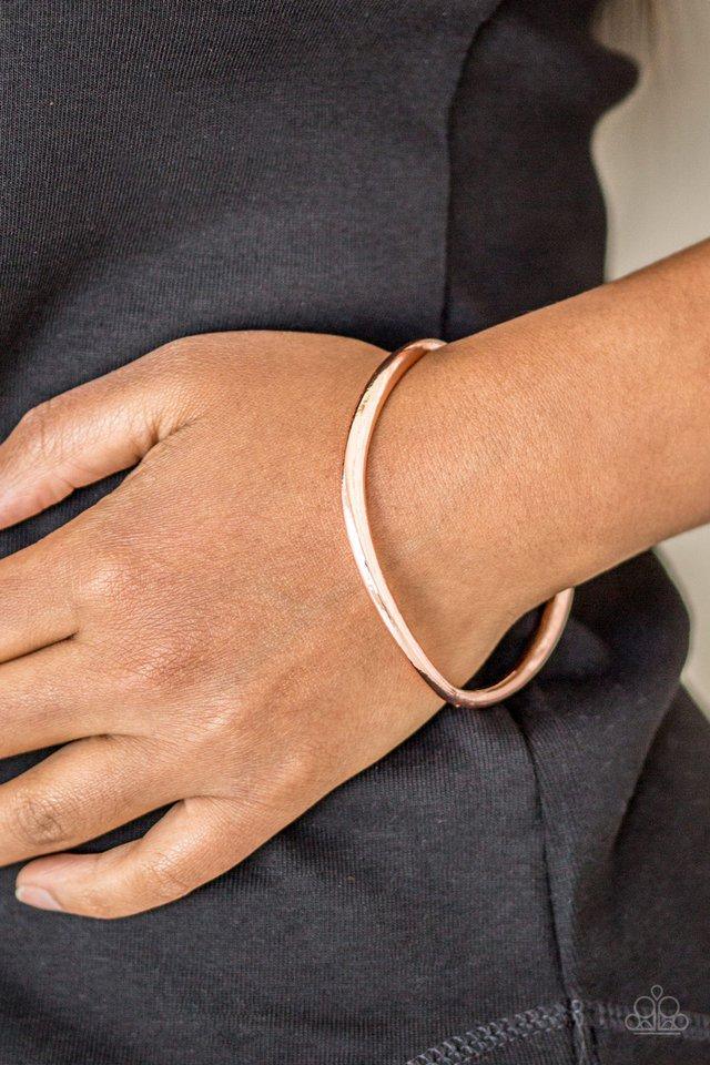 Paparazzi Accessories Awesomely Asymmetrical - Copper Featuring a warped surface, an asymmetrical shiny copper bangle slides along the wrist for an edgy look.Sold as one individual bracelet. Jewelry