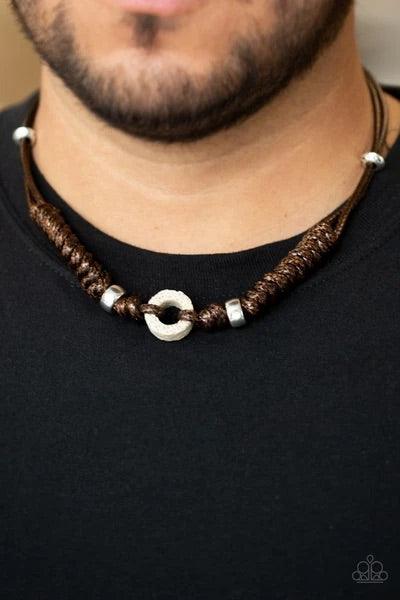 Paparazzi Accessories Beach Cruise - Brown Infused with shiny silver accents, braided brown cording knots around an earthy lava stone pendant for an urban look. Features a button loop closure. Sold as one individual necklace. Jewelry