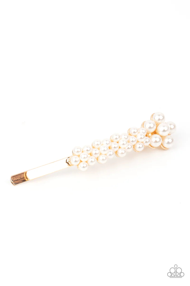 Paparazzi Accessories Pearl Patrol - White A bubbly collection of pearls adorns the front of a classic gold bobby pin, creating dainty floral accents. Sold as one individual decorative bobby pin. Hair Accessories