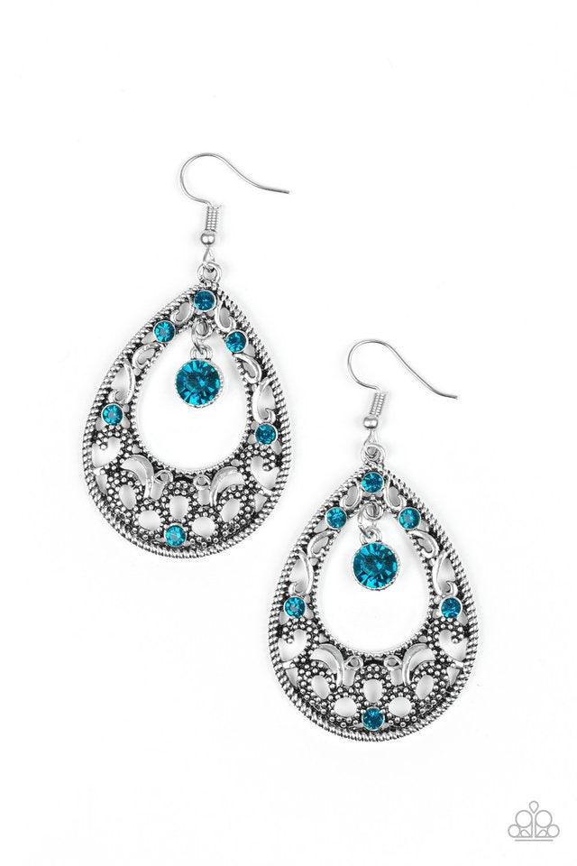Paparazzi Accessories Gotta Get That Glow - Blue Glistening and studded silver filigree swirls along a shimmery silver frame radiating with glittery blue rhinestones. A sparkling blue rhinestone swings from the top of the frame for a refined finish. Earri