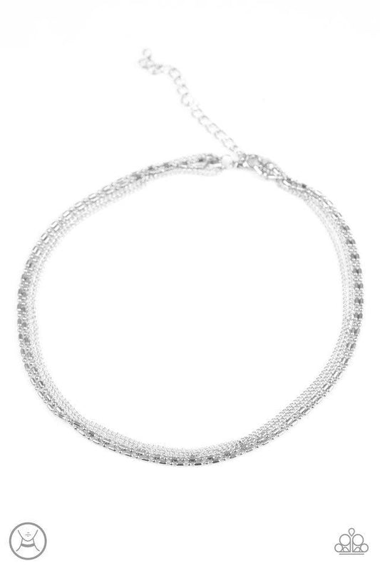 Paparazzi Accessories Metro Mayhem - Silver Mismatched dainty silver chains link around the neck for a sleek industrial look. Features an adjustable clasp closure. Sold as one individual choker necklace. Includes one pair of matching earrings. Jewelry