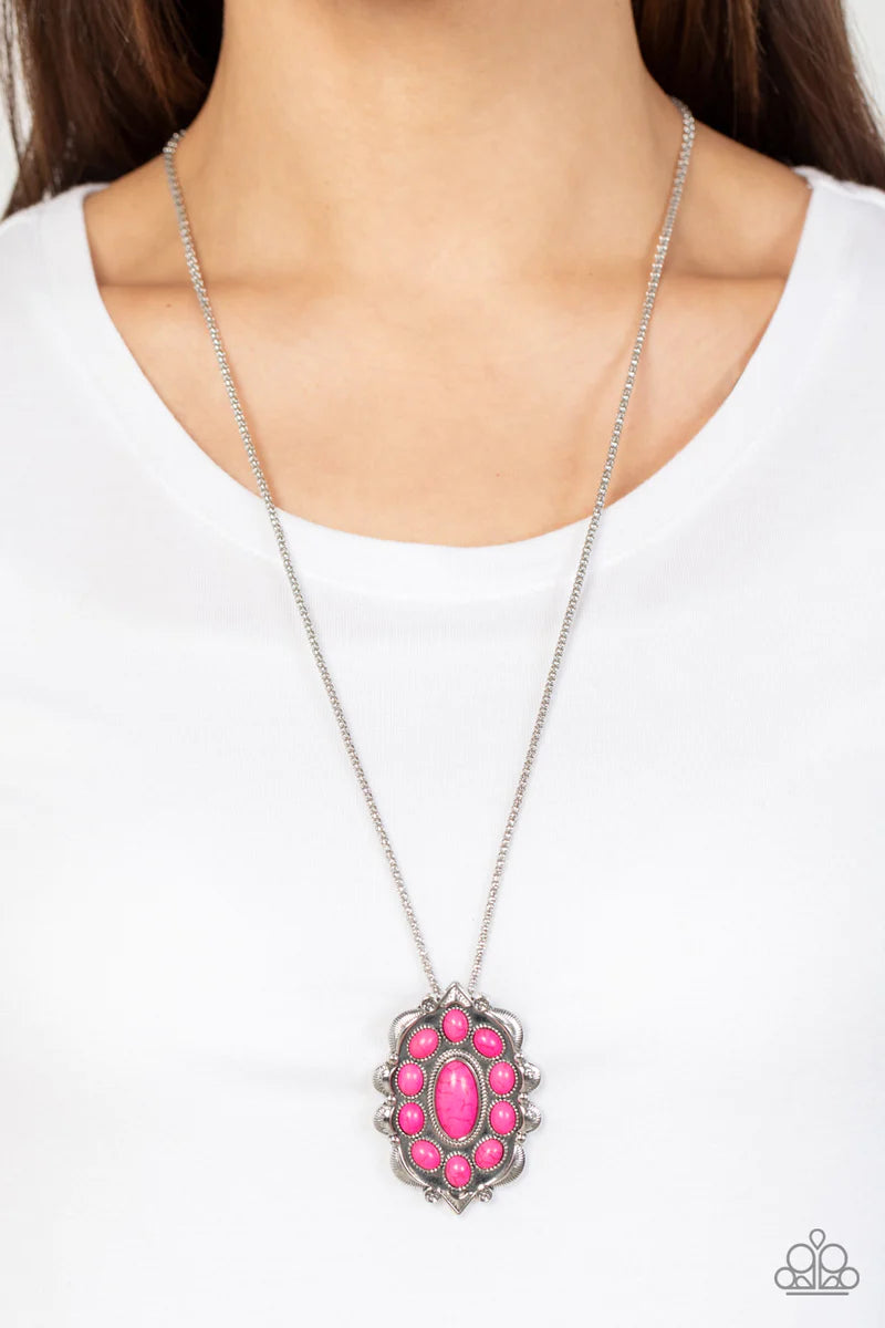 Paparazzi Accessories Mojave Medallion - Pink Vivacious pink oval stones embellish the front of a decoratively scalloped silver frame, creating an earthy floral pendant at the bottom of an extended silver popcorn chain. Features an adjustable clasp closur