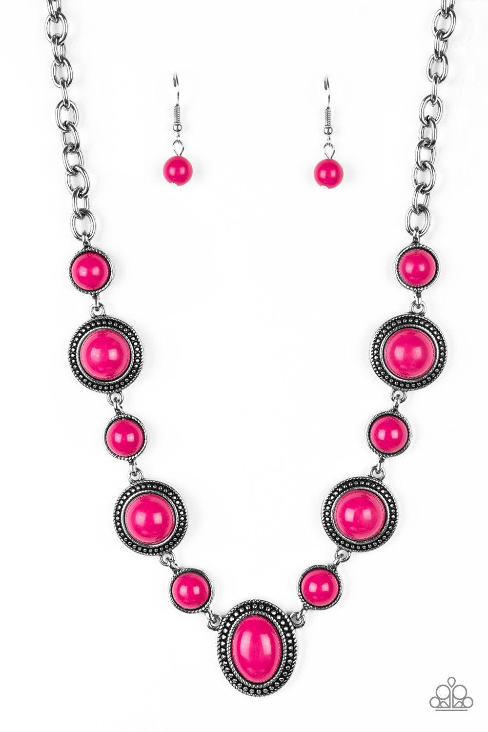 Paparazzi Accessories Voyager Vibes ~Pink Featuring smooth and studded silver frames, vivacious pink beads link below the collar in a seasonal fashion. Features an adjustable clasp closure. Sold as one individual necklace. Includes one pair of matching ea