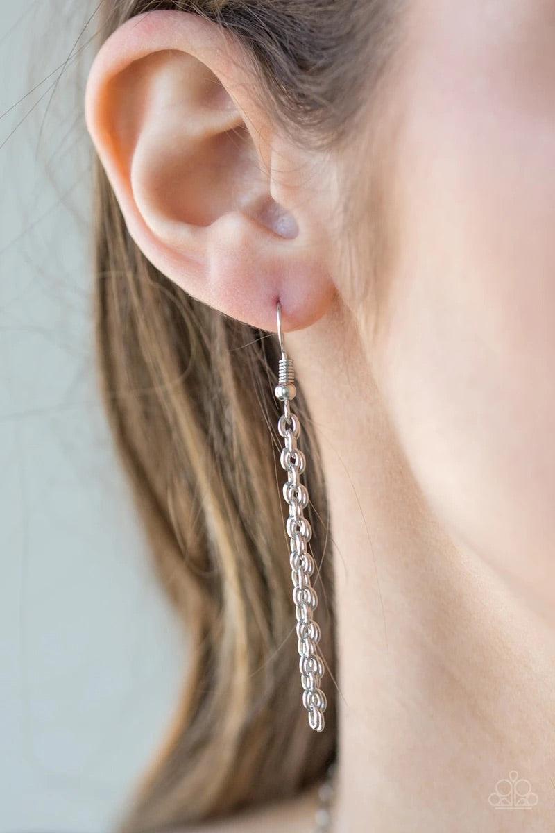 Paparazzi Accessories Summer Sunbeam - Purple large silver teardrop radiating with shimmery sunburst patterns. The tribal inspired pendant swings from the bottom of a lengthened silver chain for a dramatic look. Features an adjustable clasp closure. Sold