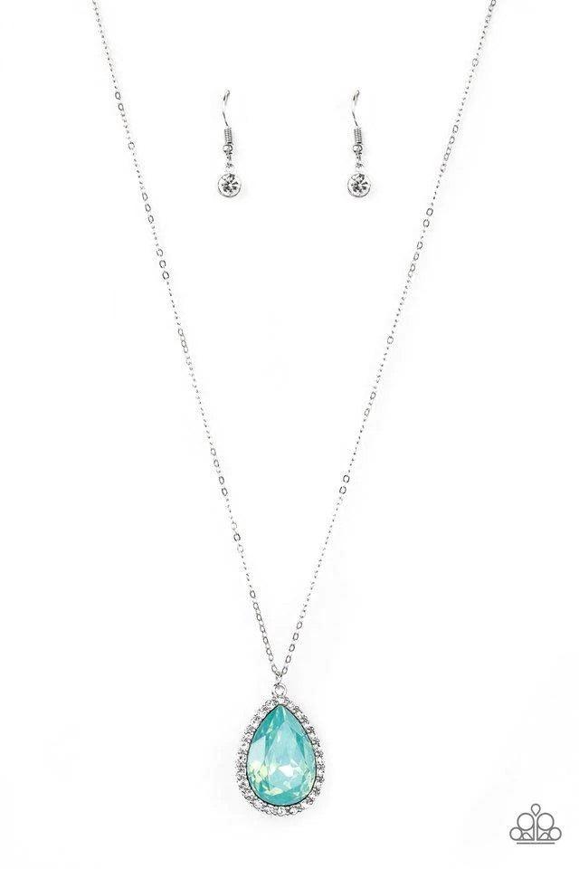 Paparazzi Accessories Come of AGELESS - Green Featuring an iridescent finish, a dramatic green teardrop gem is pressed into a shimmery silver frame radiating with glassy white rhinestones. The glamorous pendant swings from the bottom of a dainty silver ch