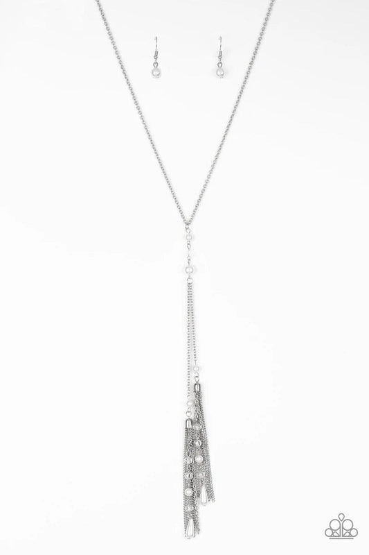 Paparazzi Accessories Timeless Tassels - Silver Dainty silver pearls and sparkling white crystal-like beads gives way to two shimmery silver chain tassels. Infused with ornate silver beads, strands of matching beads trickle down the tassels for a refined