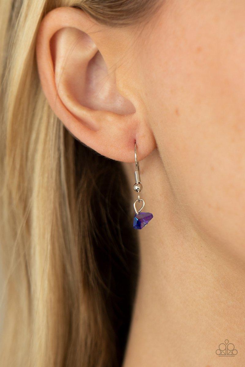 Paparazzi Accessories Olympian Oracle - Blue Featuring a blue iridescent shimmer, raw cut glassy beads trickle along a dainty silver chain, giving way to a tranquil crystal-like pendant below the collar. Features an adjustable clasp closure. Sold as one i