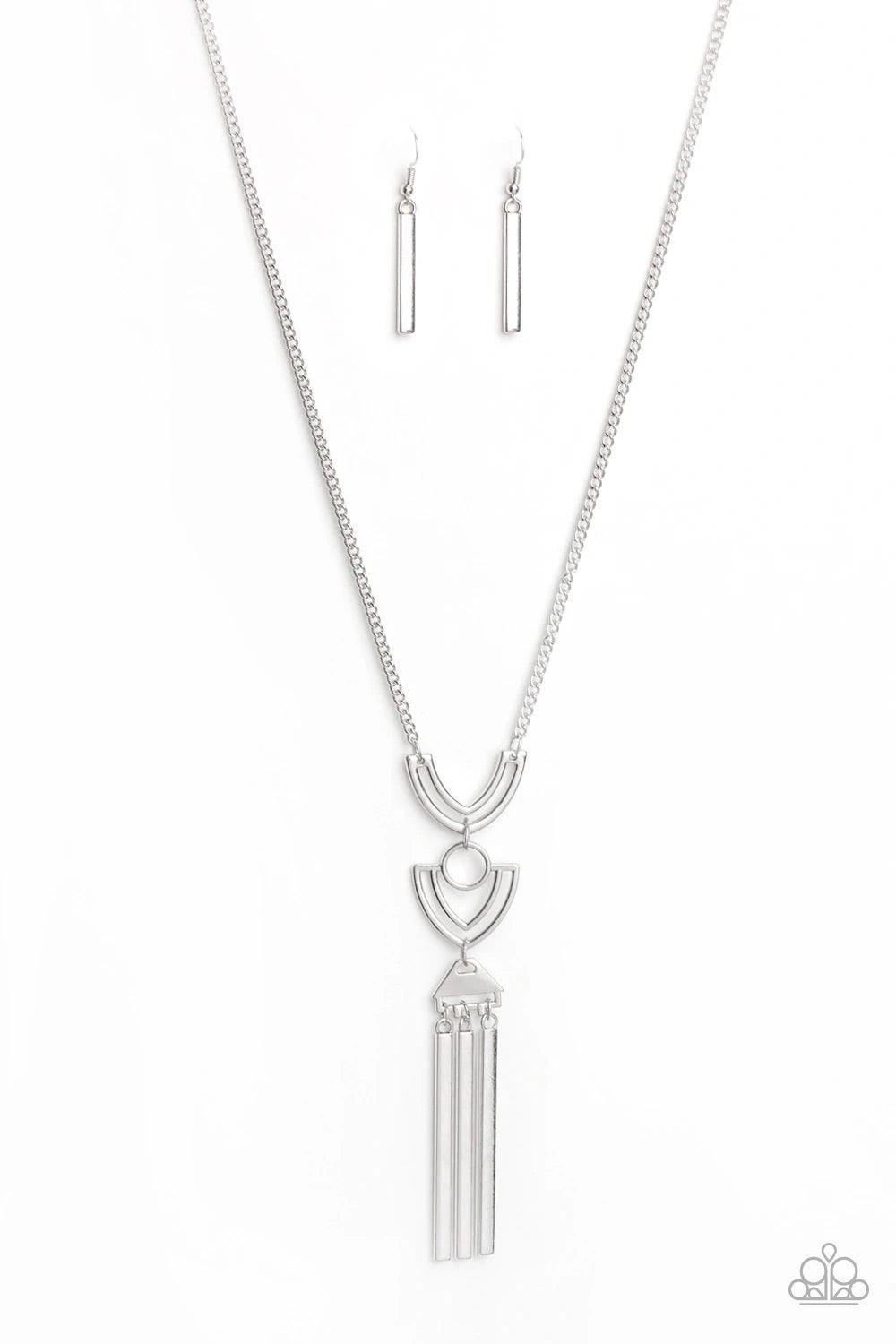 Paparazzi Accessories Confidently Cleopatra - Silver Two airy geometric silver frames link at the bottom of a lengthened silver chain, creating a stacked pendant. Rectangular bars swing from the bottom of the pendant, adding a bold movement to the tribal
