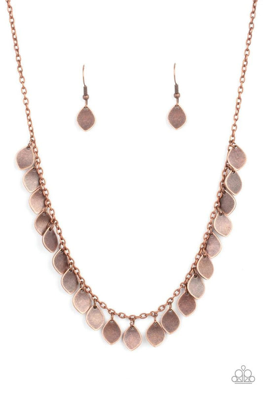 Paparazzi Accessories Dainty Discovery - Copper Teardrop copper discs drip from a dainty copper chain, creating a rustic fringe below the collar. Features an adjustable clasp closure. Sold as one individual necklace. Includes one pair of matching earrings