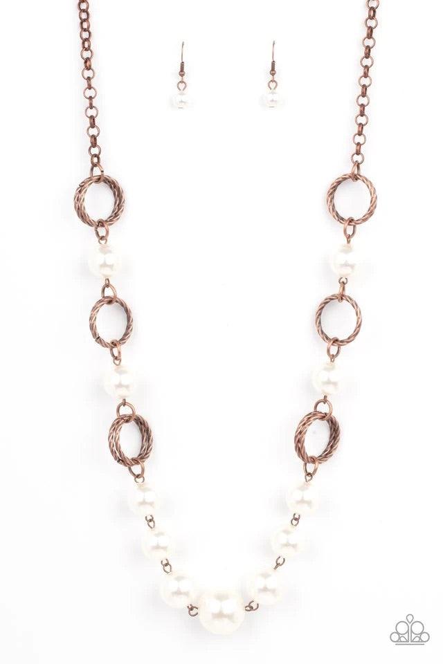 Paparazzi Accessories Countess Me In - Copper A dramatic collection of oversized white pearls and textured copper rings interconnect across the chest, creating a bold display of refinement. Features an adjustable clasp closure. Jewelry