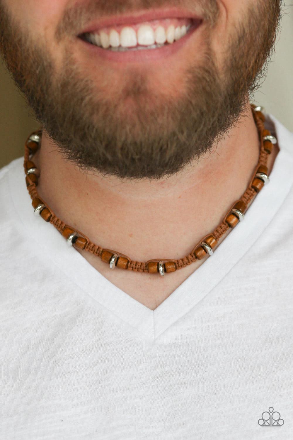 Paparazzi Accessories WOOD You Believe It? ~Brown Braided cording knots around earthy wooden and shiny silver beads below the collar for an urban look. Features a button loop closure.
