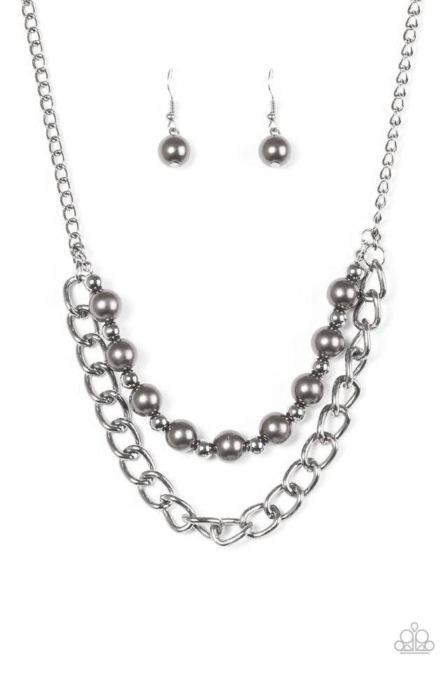 Paparazzi Accessories Glam And Grind - Black Pearly gunmetal and glistening gunmetal beads are threaded along a skinny wire. The pearly beading gives way to a bold strand of gunmetal chain, creating edgy layers below the collar. Features an adjustable cla