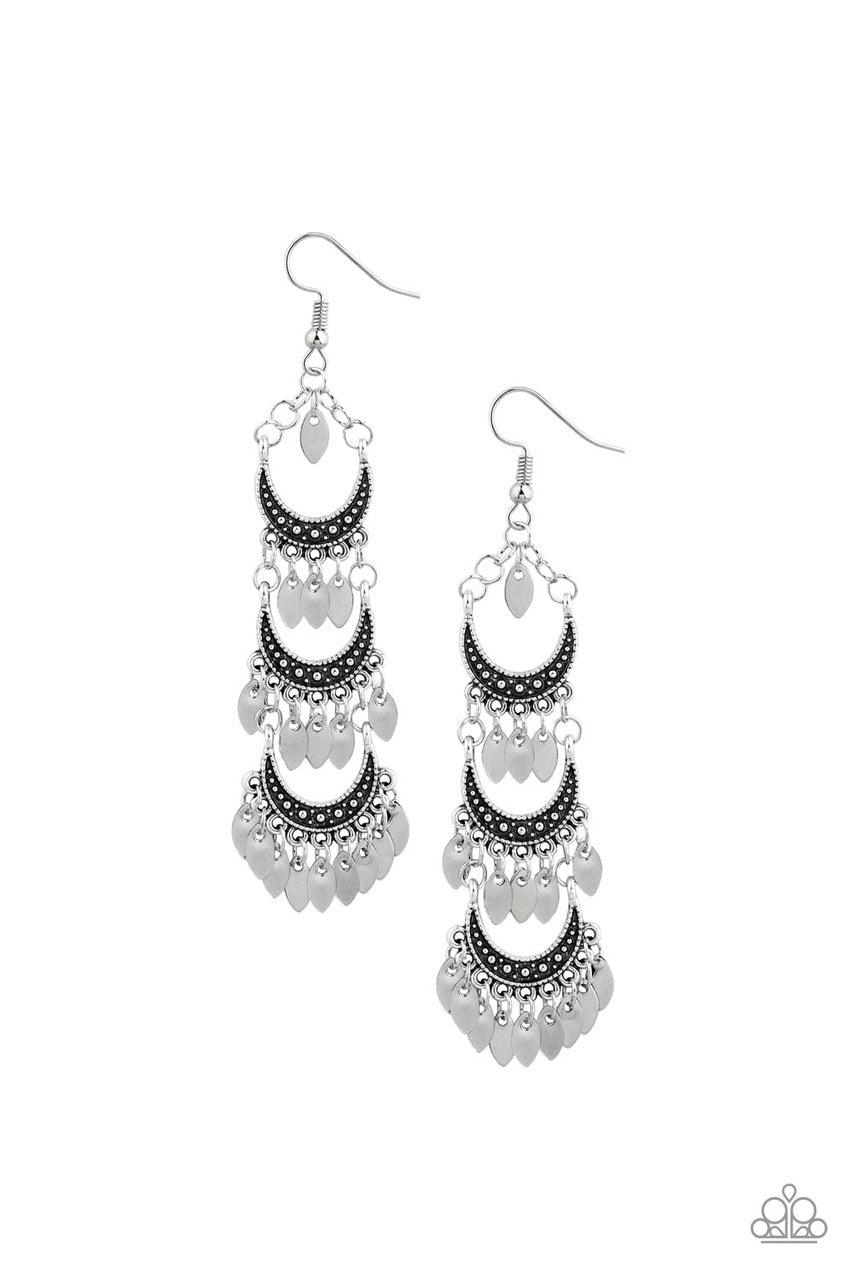 Paparazzi Accessories Take Your Chime - Silver Dotted with silver studded texture, three half-moon frames link into a stacked lure. Feathery silver accents dangle from the bottoms, creating a tiered fringe. Earring attaches to a standard fishhook fitting.