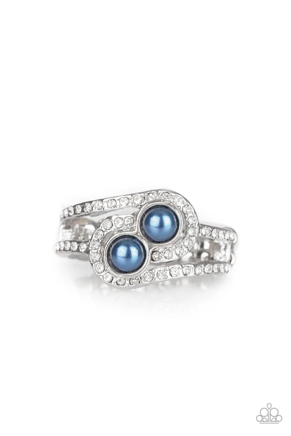Paparazzi Accessories Collect Up Front - Blue Glittery white rhinestone encrusted bands swirl around a pair of dainty blue pearls for a refined look. Features a dainty stretchy band for a flexible fit. Sold as one individual ring. Jewelry