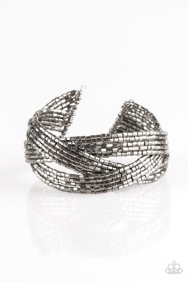 Paparazzi Accessories Shooting Stars ~Gunmetal Layers of gunmetal seed beads are braided together to create a breathtaking cuff design that shimmers brilliantly along the wrist.