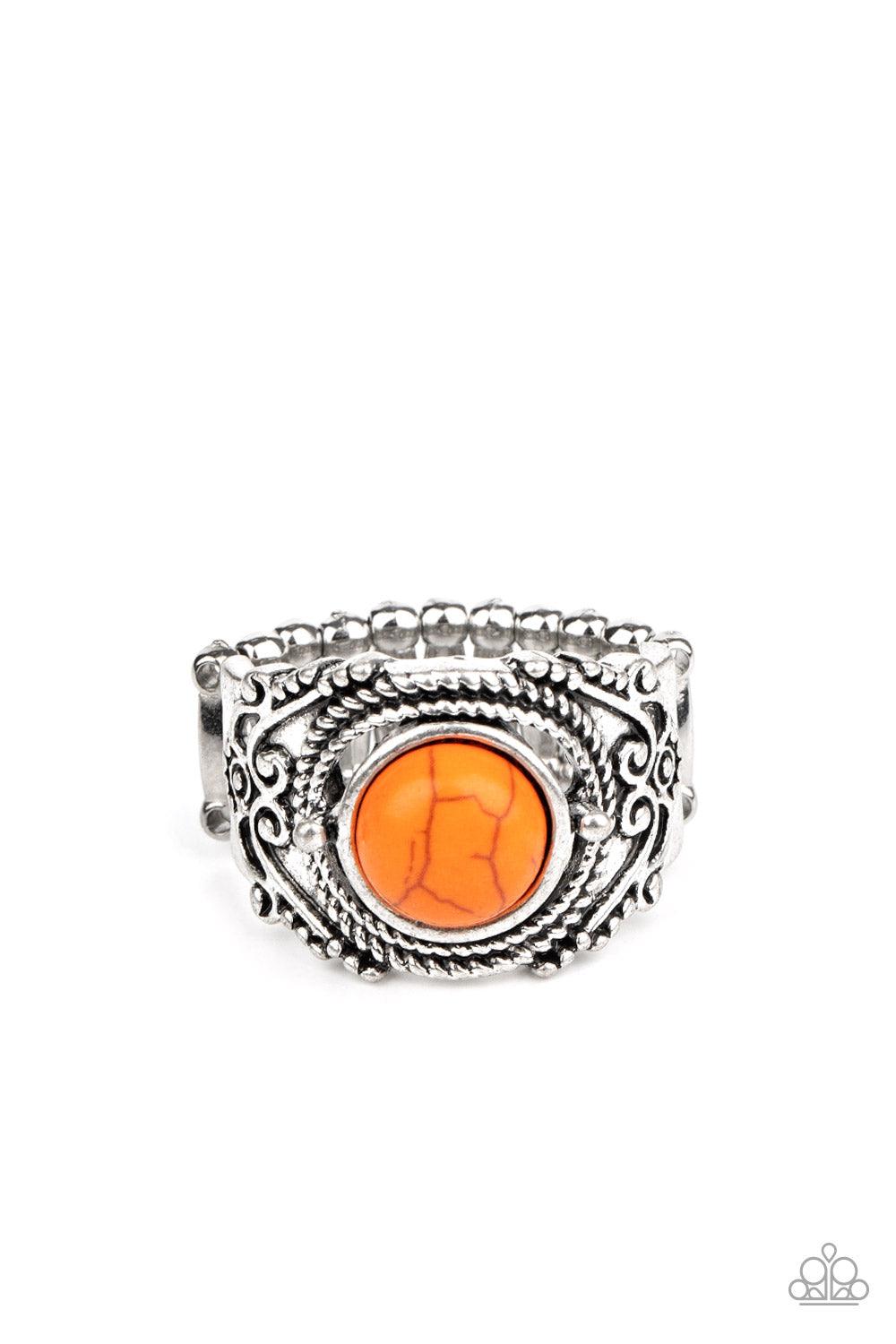 Paparazzi Accessories Stand Your Ground - Orange A refreshing orange stone is pressed into an ornate silver band radiating with rope-like and studded textures for a seasonal look. Features a stretchy band for a flexible fit. Sold as one individual ring. J
