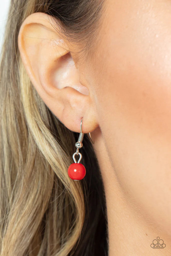 Paparazzi Accessories All Across The GLOBETROTTER - Red Varying in size, a glassy collection of red teardrops alternate with dainty silver beads in two rows below the collar for a glamorous pop of color. Features an adjustable clasp closure. Sold as one i