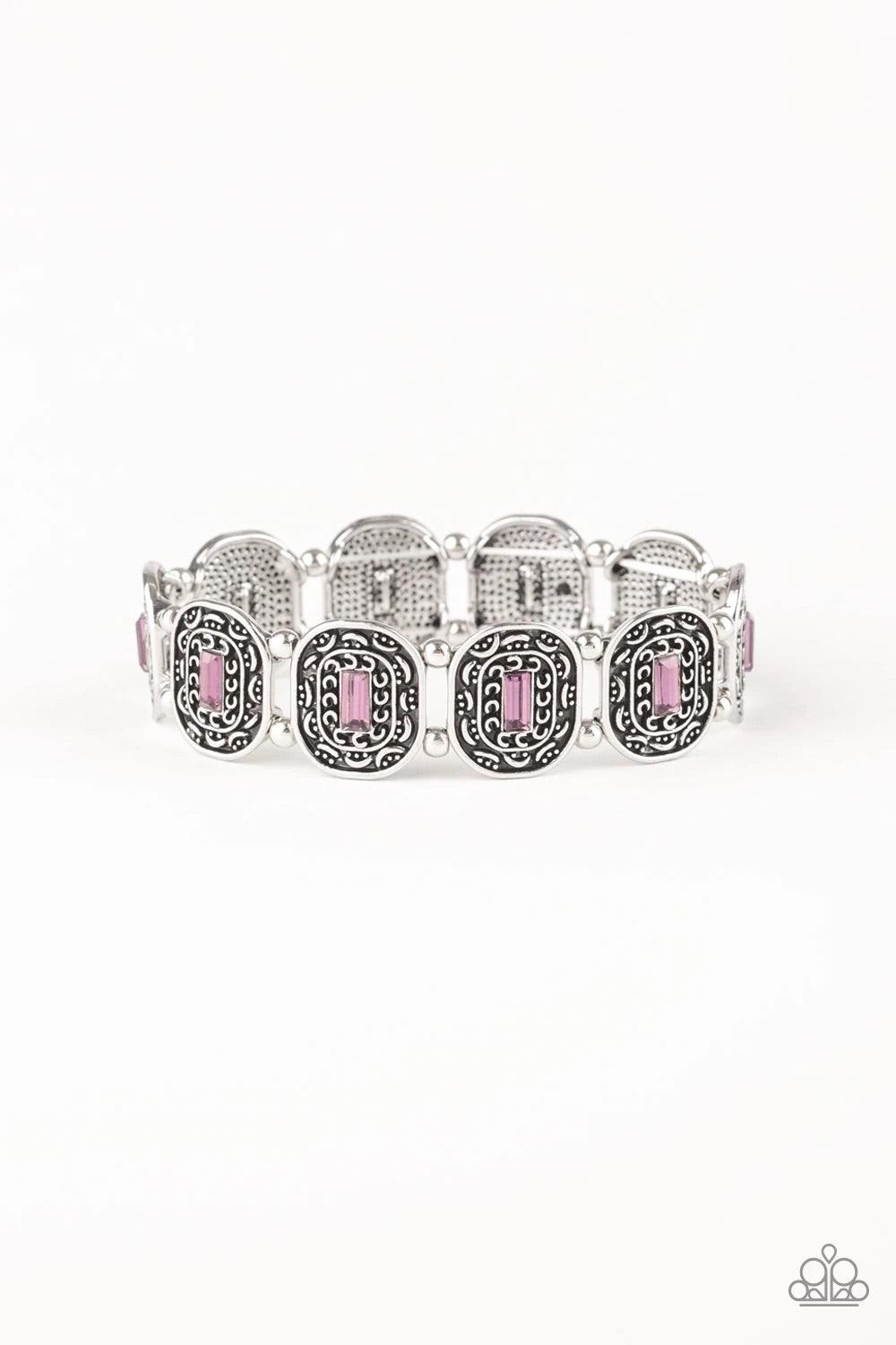 Paparazzi Accessories Hidden Fortune - Purple Featuring purple emerald-cut rhinestone centers, ornate silver frames are threaded along stretchy bands around the wrist for a refined fashion. Jewelry