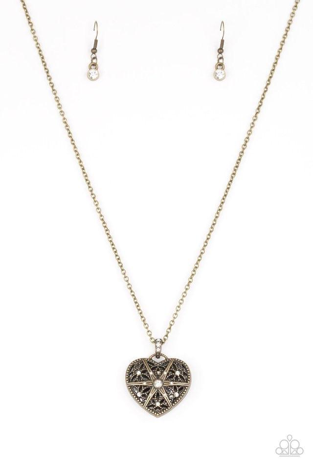 Paparazzi Accessories Casanova Charm ~Brass Encrusted in glittery white rhinestones, a vintage inspired heart pendant swings from the bottom of a shimmery brass chain for a romantic fashion. Features an adjustable clasp closure.