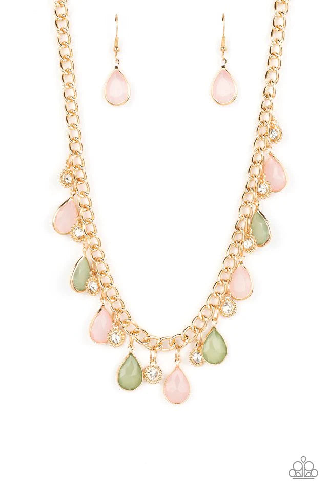 Paparazzi Accessories Frosted and Framed - Multi A thick gold chain is decorated in faceted Loden Frost and baby pink teardrops wrapped in gold frames. The opacity of the beads adds a dreamy feel to the design, while tiny gold accents dotted with white rh