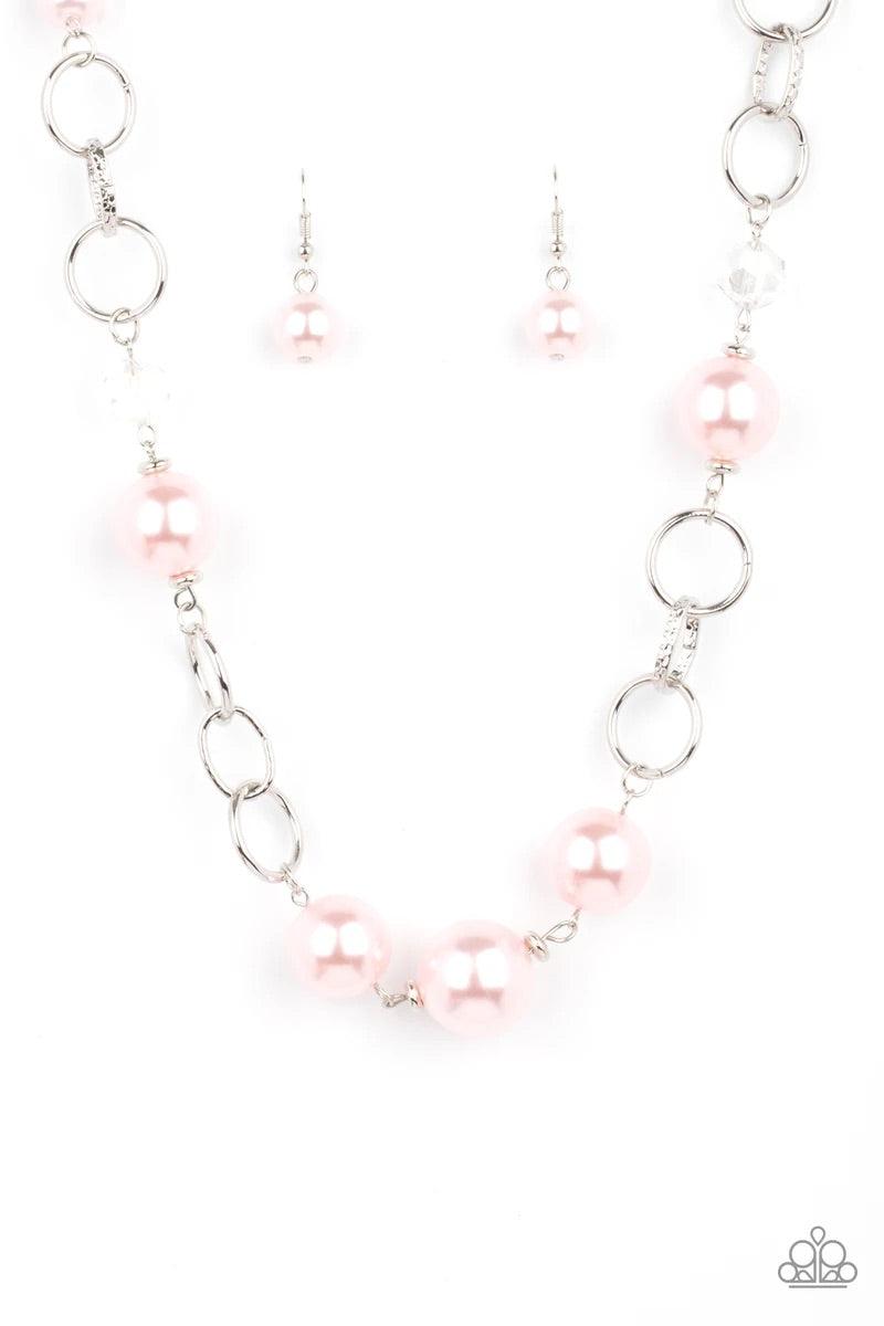 Paparazzi Accessories New Age Novelty - Pink Sections of bold silver links, oversized pink pearls, and glassy crystal-like beads haphazardly connect below the collar, creating a dramatic display. Features an adjustable clasp closure. Sold as one individua