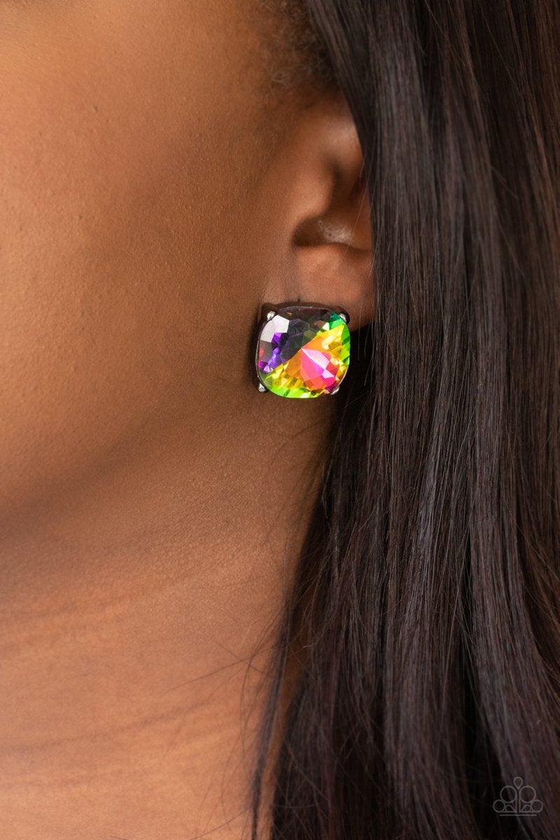 Paparazzi Accessories Royalty High - Multi A dramatically oversized oil spill gem is nestled atop a pronged gunmetal frame, creating a jaw-dropping dazzle. Earring attaches to a standard post fitting. Sold as one pair of post earrings. Jewelry
