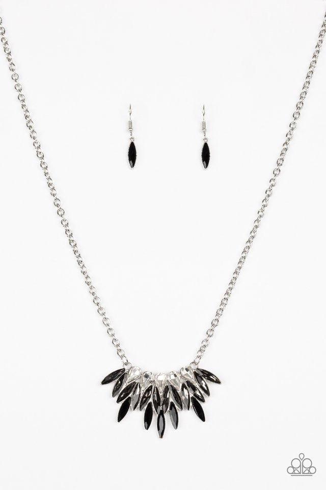Paparazzi Accessories Crown Couture - Black Featuring regal teardrop and marquise style cuts, glittery white, smoky gray, and glassy black rhinestones fan below the collar for a dramatic look. Features an adjustable clasp closure. Sold as one individual n