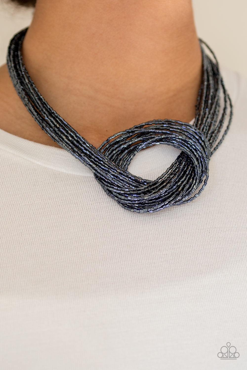 Paparazzi Accessories Knotted Knockout - Blue Countless strands of metallic blue seed beads delicately knot together below the collar to create an unforgettable statement piece. Features an adjustable clasp closure. Jewelry