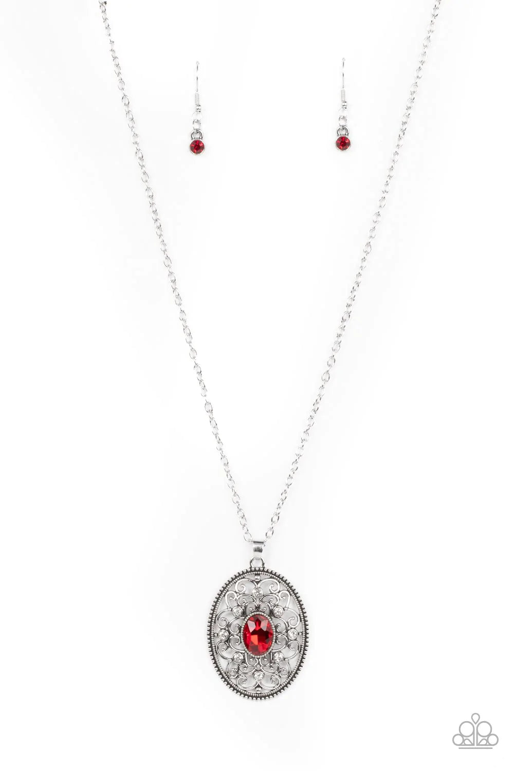 Paparazzi Accessories Sonata Swing - Red Dainty white rhinestones are sprinkled across silver vine-like filigree that whirls around an oval red gem center inside of a studded silver frame, resulting in a whimsical pendant at the bottom of a silver chain.
