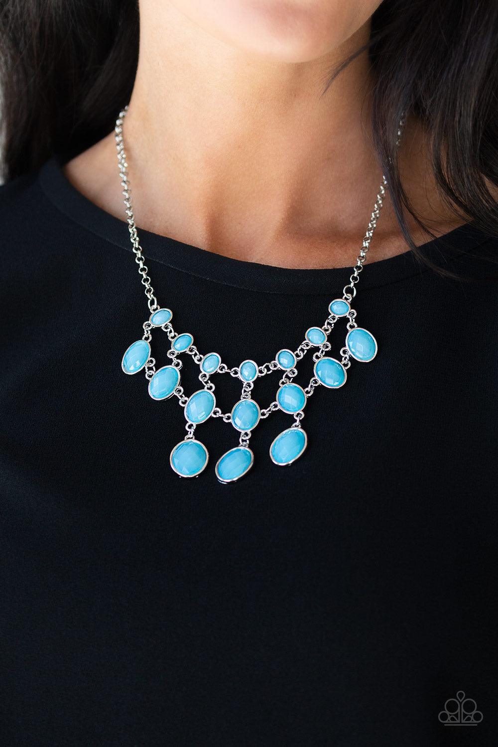 Paparazzi Accessories Mermaid Marmalade - Blue Gradually increasing in size as they cascade down the chest, rows of opalescent blue gems link together below the collar in a glamorous netted fringe. Features an adjustable clasp closure. Jewelry