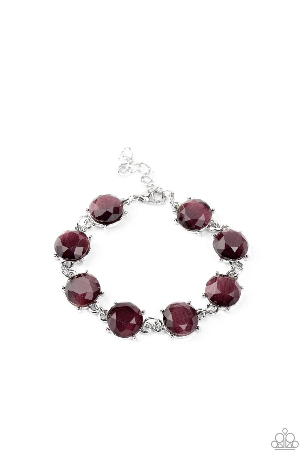 Paparazzi Accessories Ms. GLOW-It-All - Purple A glowing collection of faceted purple cat's eye stone frames delicately connect across the wrist for an ethereal look. Features an adjustable clasp closure. Sold as one individual bracelet. Jewelry