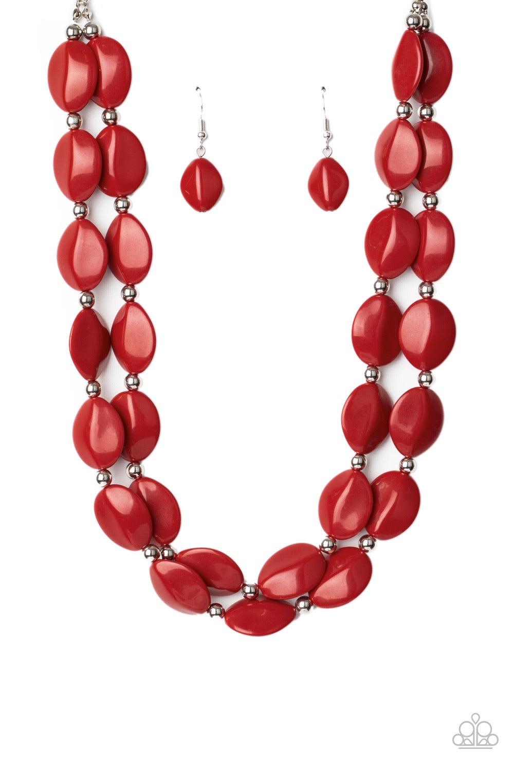 Paparazzi Accessories Two-Story Stunner - Red Two rows of dainty silver beads and faceted Samba faux stone beads alternate along invisible wires below the collar, creating bold, colorful layers. Features an adjustable clasp closure. Sold as one individual
