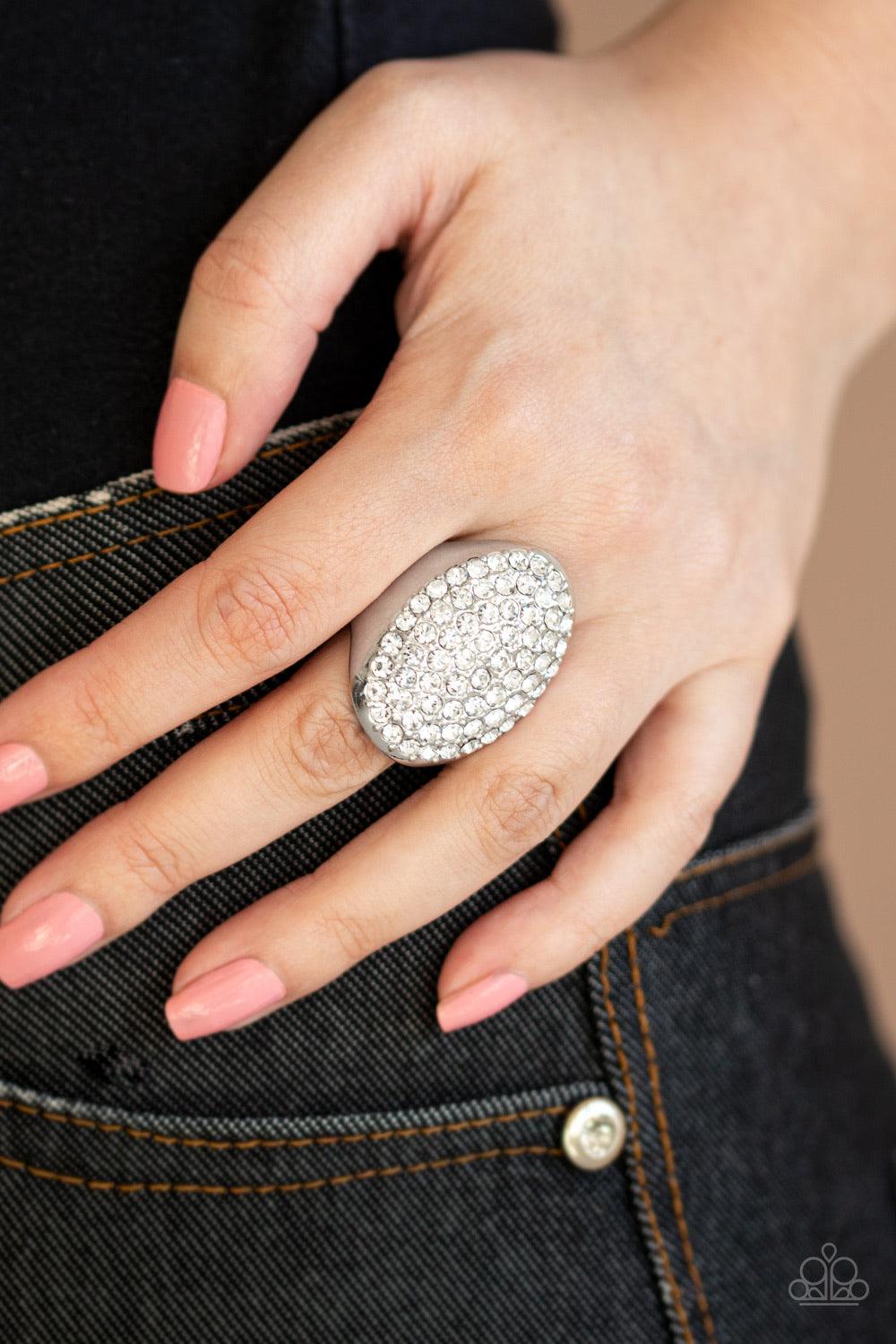 Paparazzi Accessories Bling Scene - White Row after row of dazzling white rhinestones radiate out from the center of a thick silver frame, creating a blinding centerpiece atop the finger. Features a stretchy band for a flexible fit. Jewelry