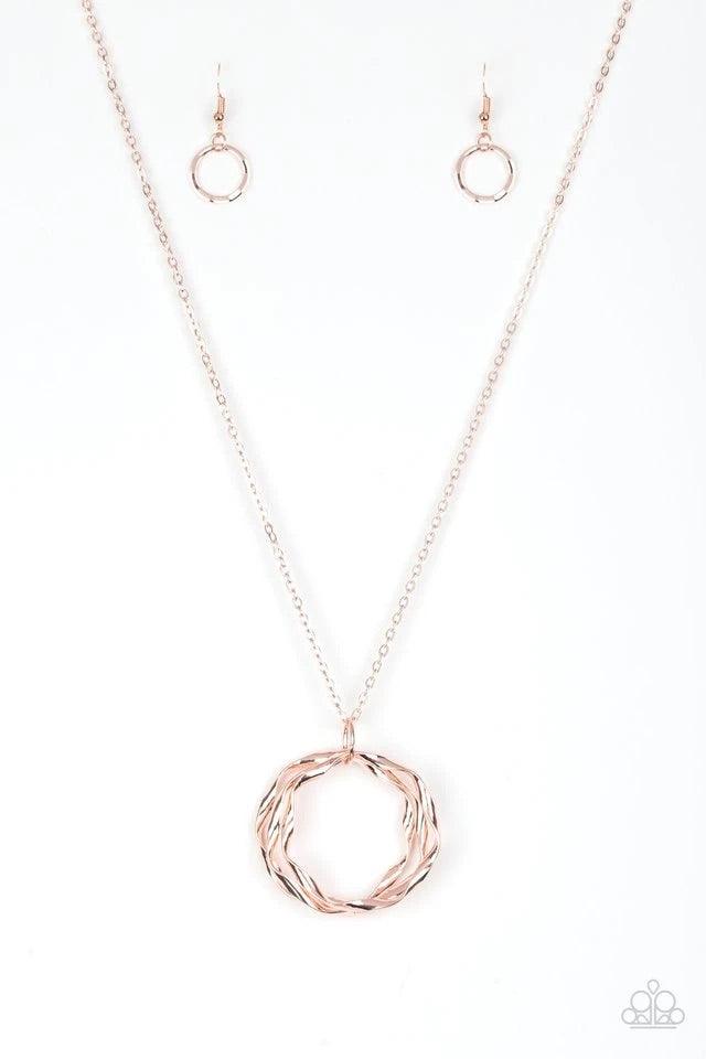 Paparazzi Accessories Millennial Minimalist - Gold Twirling rose gold hoops swing from the bottom of an elegantly elongated rose gold chain, creating a dizzying pendant. Features an adjustable clasp closure. Sold as one individual necklace. Includes one p