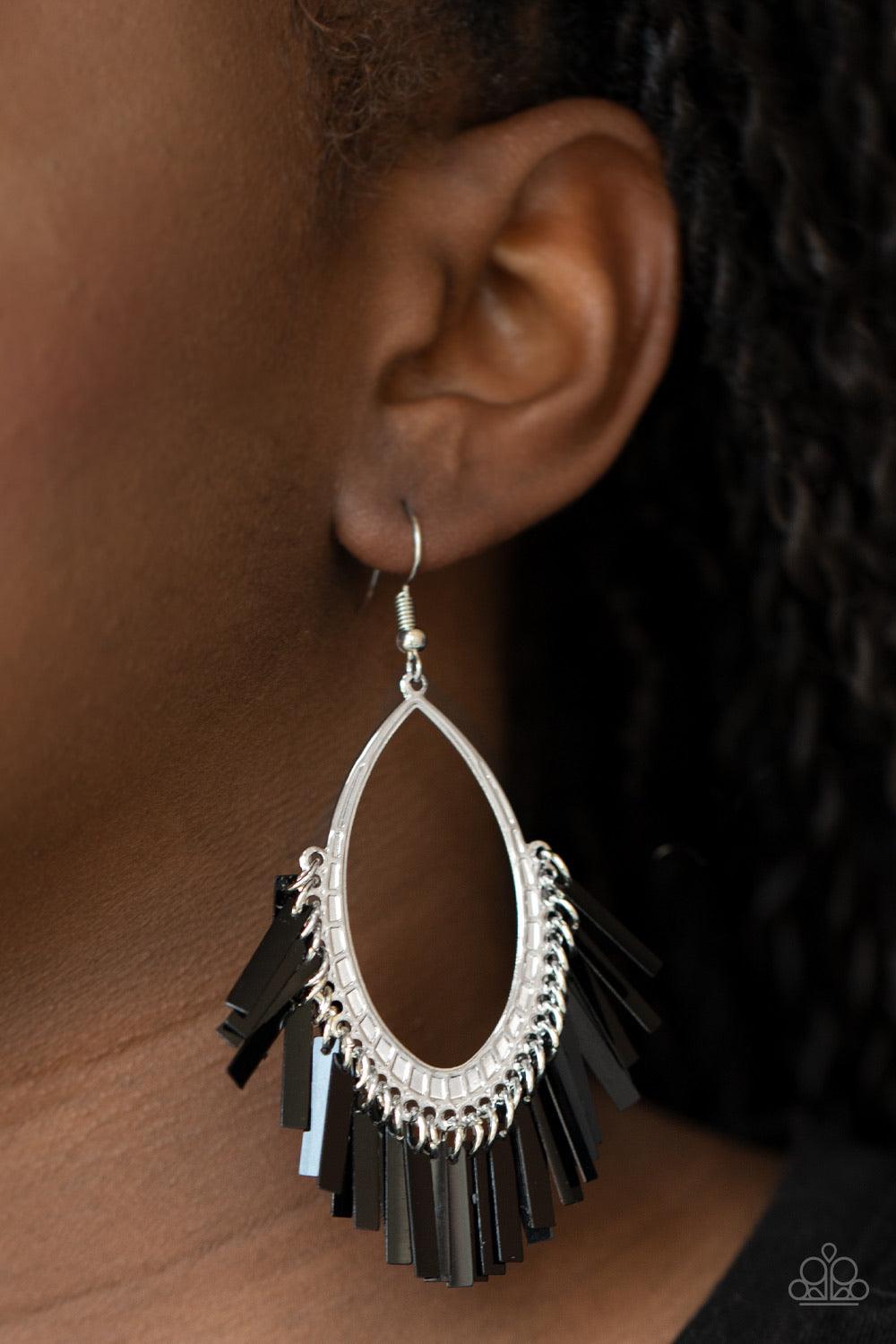 Paparazzi Accessories Fine-Tuned Machine - Black Featuring a shiny black metallic finish, flat rectangular rods dangle from the bottom of a textured silver frame, creating an edgy fringe. Earring attaches to a standard fishhook fitting. Sold as one pair o