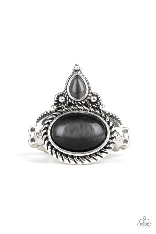 Paparazzi Accessories Malibu Mist - Silver A teardrop and oval cat's eye stone is pressed into an ornate silver frame radiating with studded and metallic rope textures for a whimsical flair. Features a dainty stretchy band for a flexible fit. Jewelry