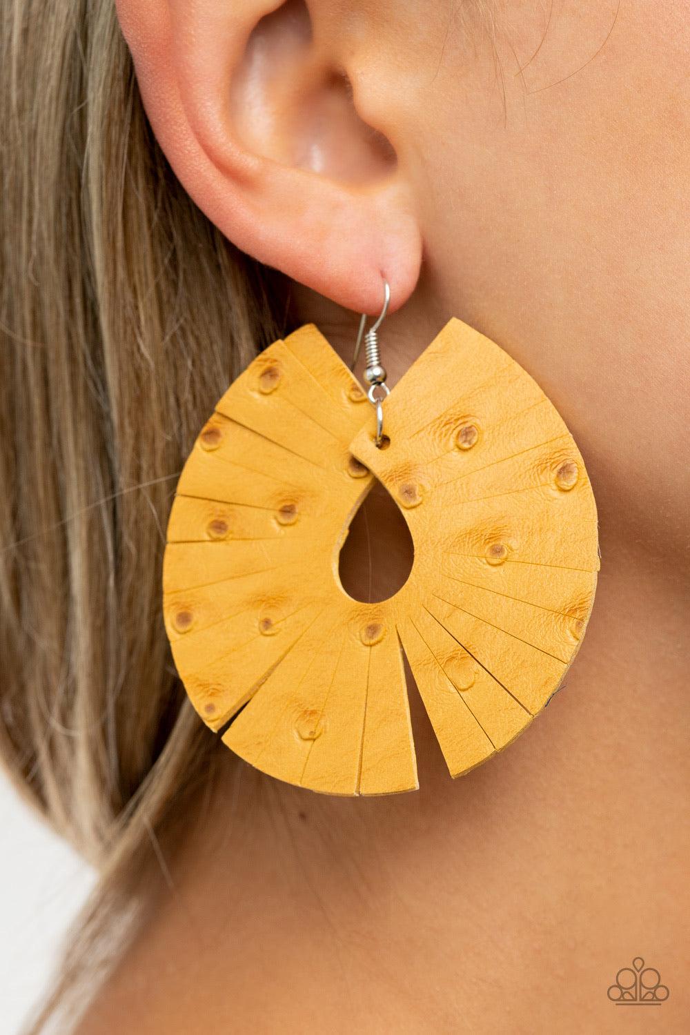 Paparazzi Accessories Palm Island - Yellow Dotted in distressed textures, a golden yellow leather teardrop is spliced into a trendy fringe-like pattern. Earring attaches to a standard fishhook fitting. Sold as one pair of earrings. Jewelry