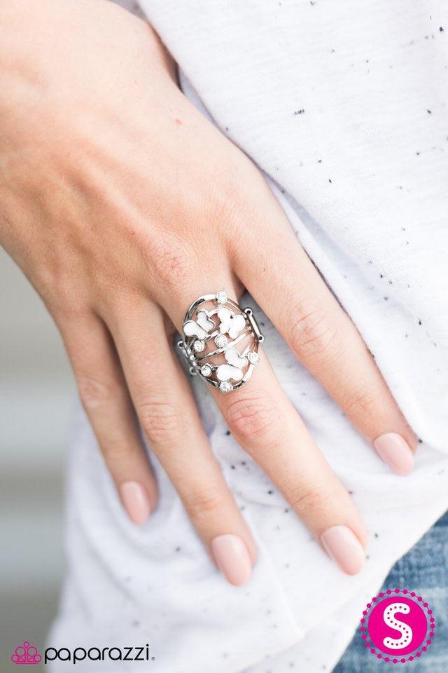 Paparazzi Accessories Butterfly Botanical - White Dainty white butterflies dance across the finger. Dazzling white rhinestones are sprinkled across the arcing silver bands, adding a sparkling finish to the whimsical palette. Jewelry