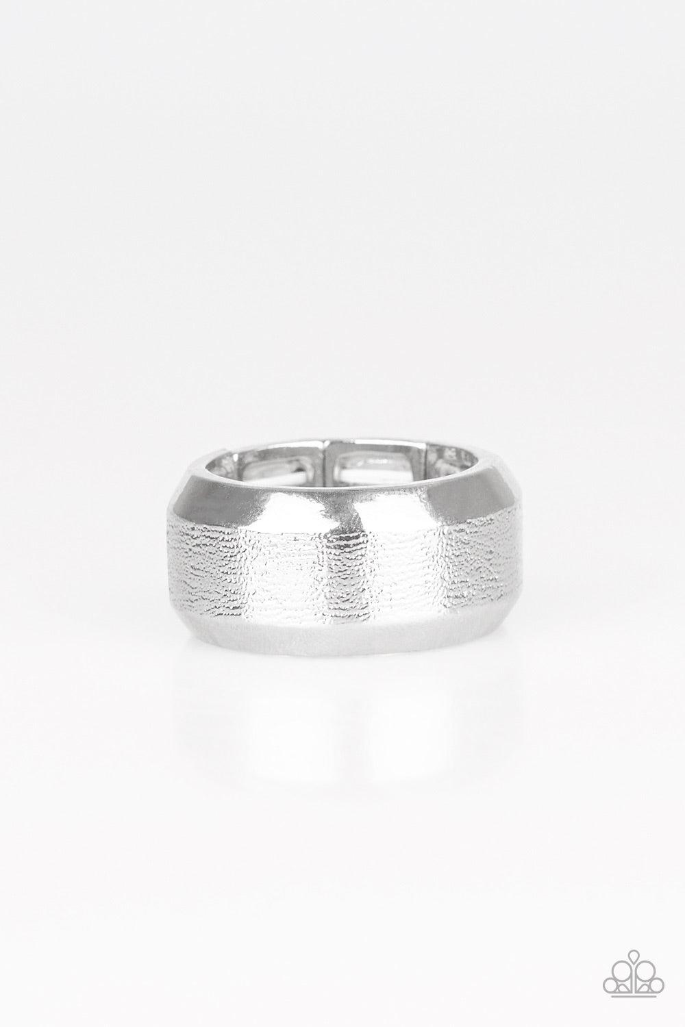 Paparazzi Accessories Checkmate - Silver The center of a beveled silver band has been delicately hammered in shimmery detail for a metro inspired look. Features a stretchy band for a flexible fit. Jewelry