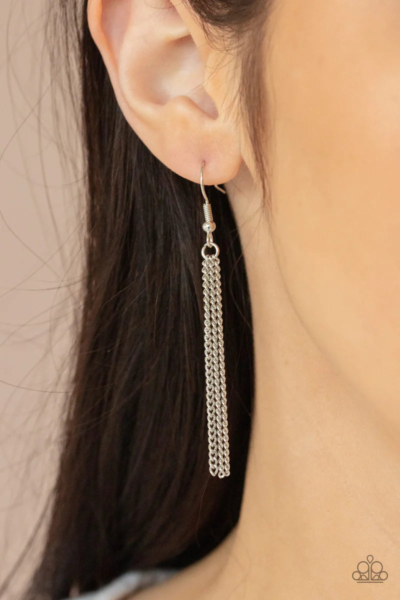 Paparazzi Accessories Timeless Talisman - Black Encased in an antiqued silver frame, an oversized black gem swings from the bottom of an ornate silver chain. A shimmery silver chain tassel swings from the bottom of the sparkly pendant, creating a regal ta