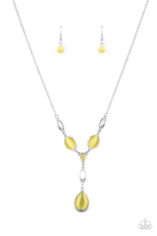Paparazzi Accessories Ritzy Refinement - Yellow Smoldering yellow cat's eye stones and silver accents delicately link across the collar. A stunning yellow cat's eye teardrop pendant swings from a silver loop for a sophisticated and refined finish. Feature