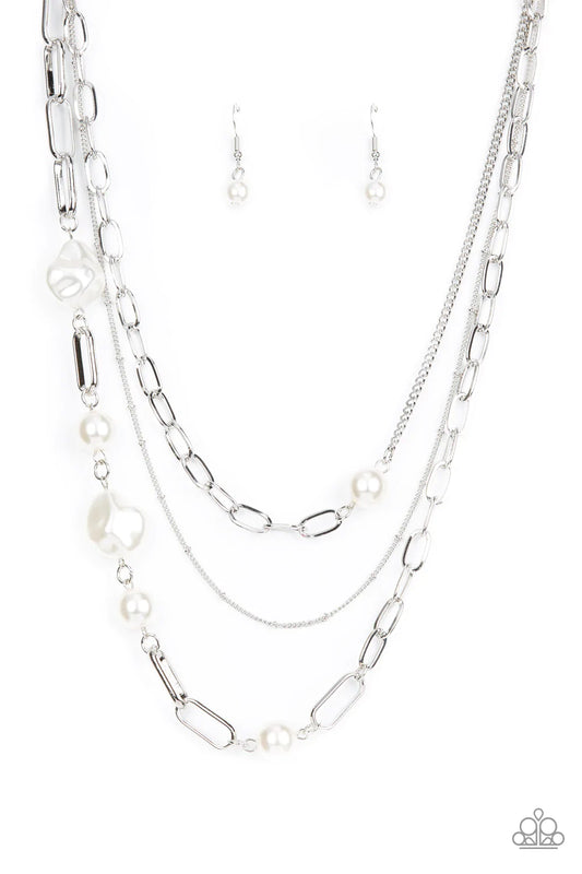 Paparazzi Accessories Modern Innovation - White Bubbly round and imperfectly faceted white pearls haphazardly adorn an assortment of mismatched chunky and dainty silver chains, resulting in an edgy refinement below the collar. Features an adjustable clasp