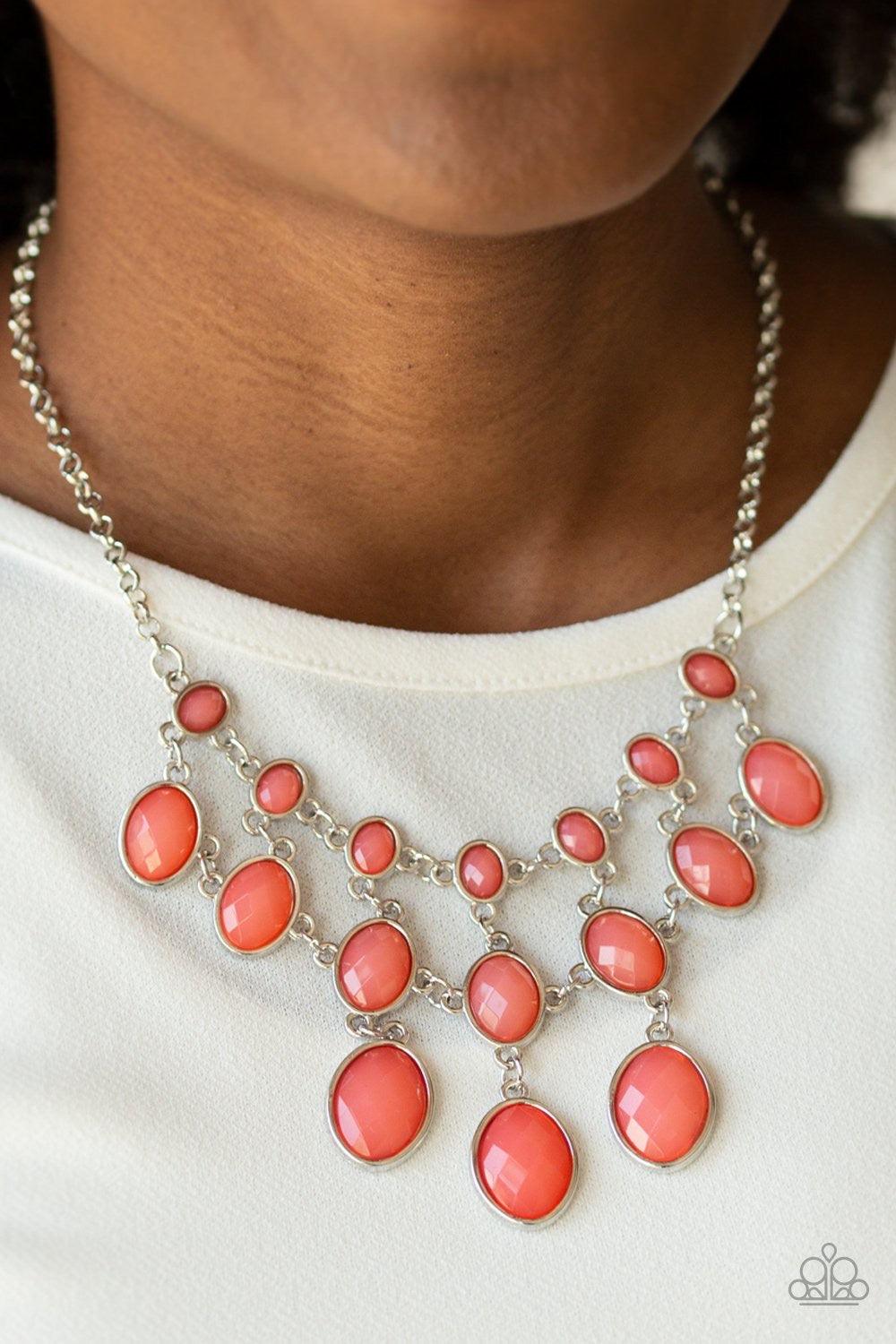 Paparazzi Accessories Mermaid Marmalade - Orange Gradually increasing in size as they cascade down the chest, rows of opalescent coral gems link together below the collar in a glamorous netted fringe. Features an adjustable clasp closure. Jewelry