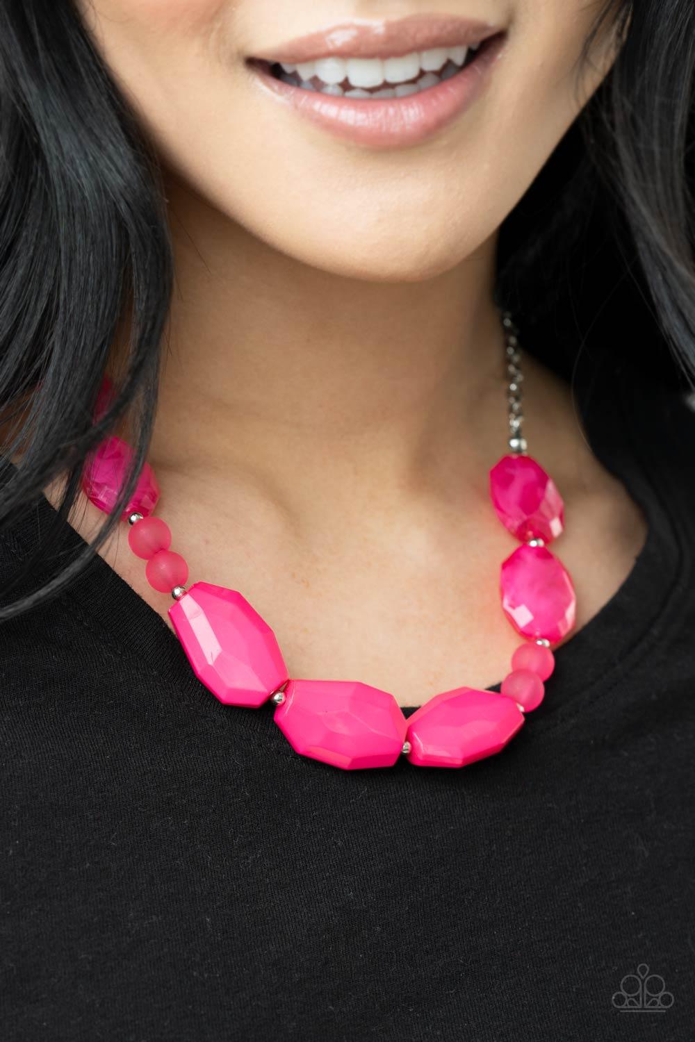 Paparazzi Accessories Melrose Melody - Pink A series of opaque and cloudy faceted Raspberry Sorbet beads are threaded along an invisible wire. Dainty silver beads add shining accents as they traverse across the collar on a silver chain in a brightly melod