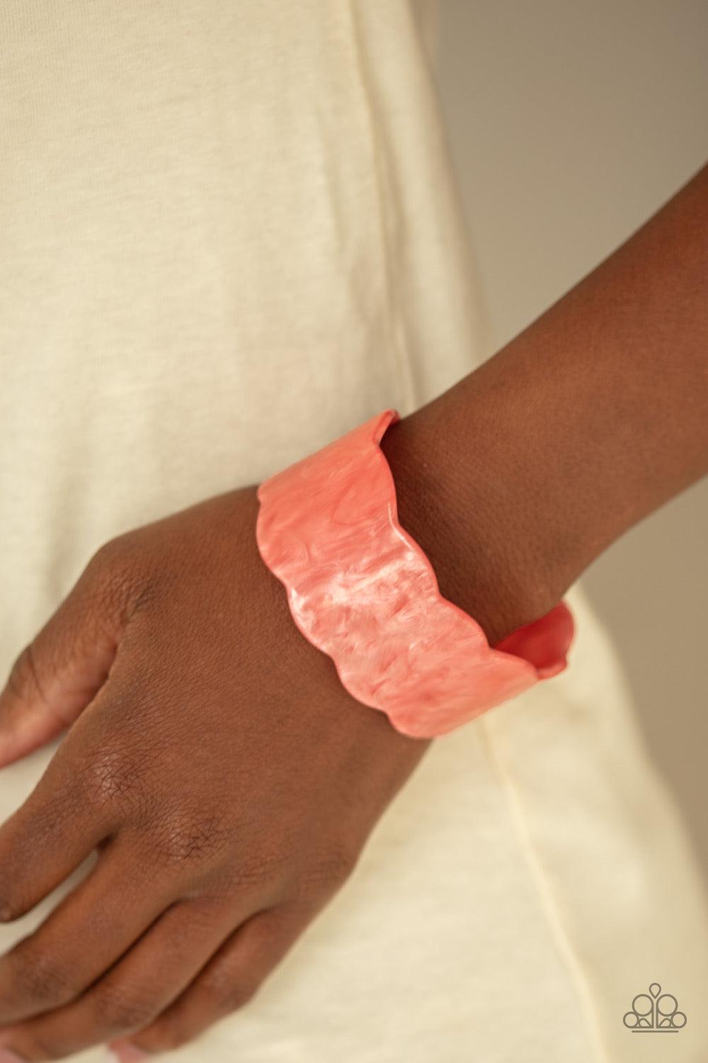 Paparazzi Accessories Retro Ruffle - Orange Flecked in shimmer, a scalloped coral acrylic cuff waves across the wrist for a colorfully retro look. Jewelry