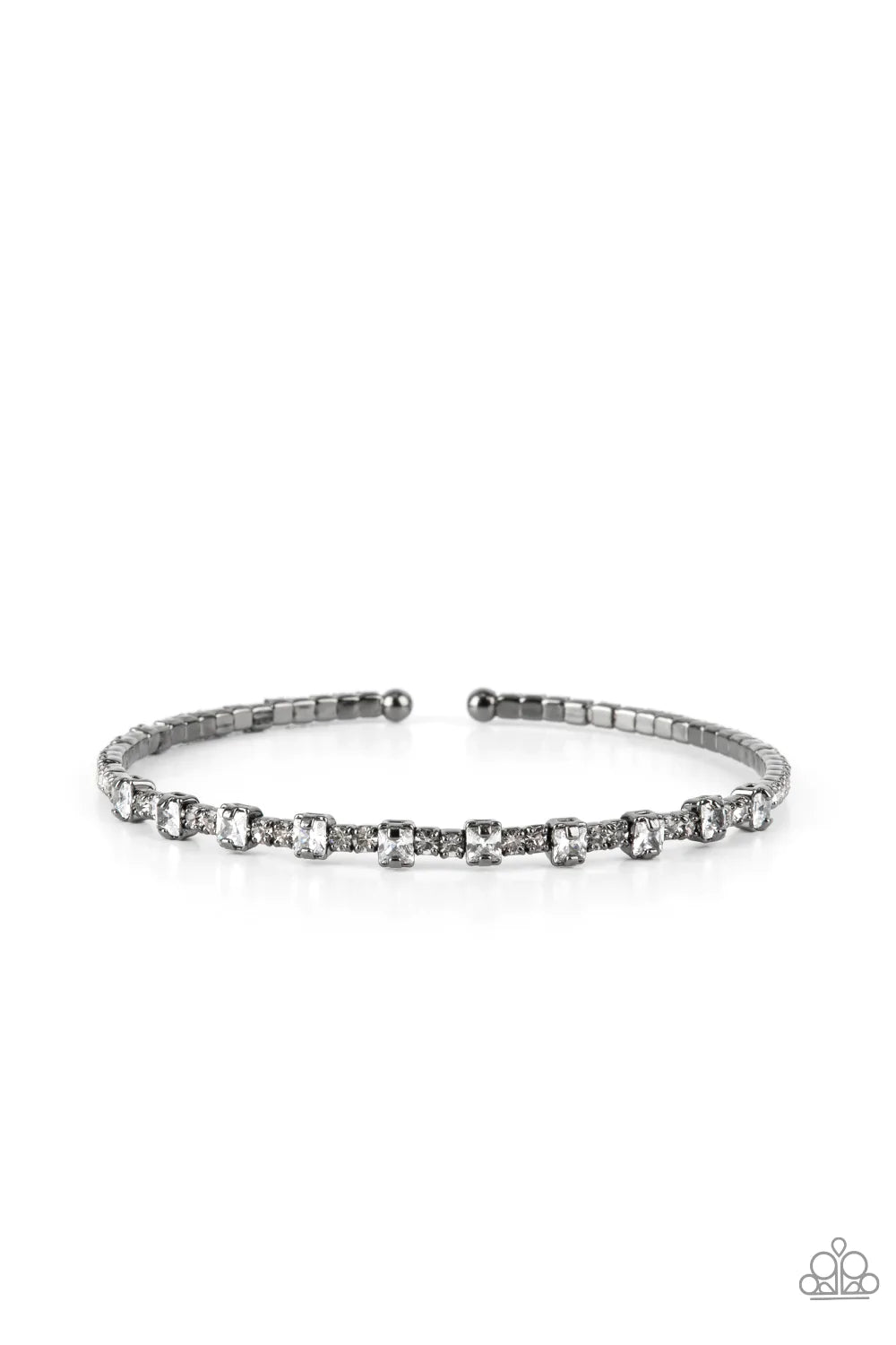 Paparazzi Accessories Timelessly Tiny - Black Featuring sleek gunmetal fittings, a classic band of dainty white rhinestones is interrupted with square cut white rhinestones, adding a timeless twist to the stackable cuff. Sold as one individual bracelet. B