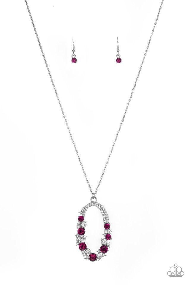 Paparazzi Accessories Spotlight Social - Pink Varying in size, an array of glittery white and pink rhinestones are encrusted along a shimmery silver hoop. The sparkling pendant swings from the bottom of an elongated silver chain for a glamorous finish. Fe
