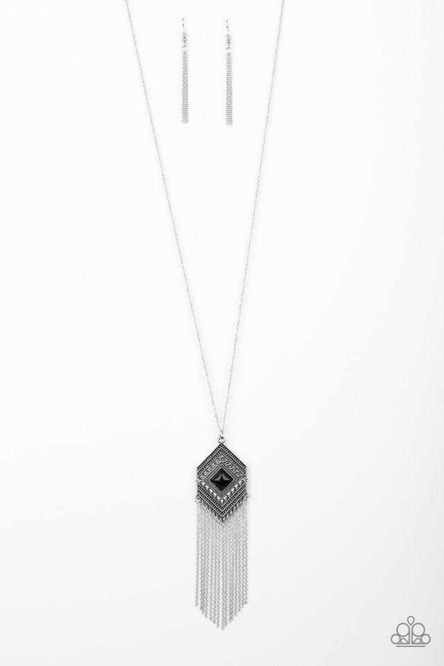 Paparazzi Accessories Work The Roam - Black A square black bead is pressed into the center of a silver geometric pendant radiating with studded detail. A shimmery silver fringe swings from the bottom of the tribal inspired frame for a wanderlust finish. F