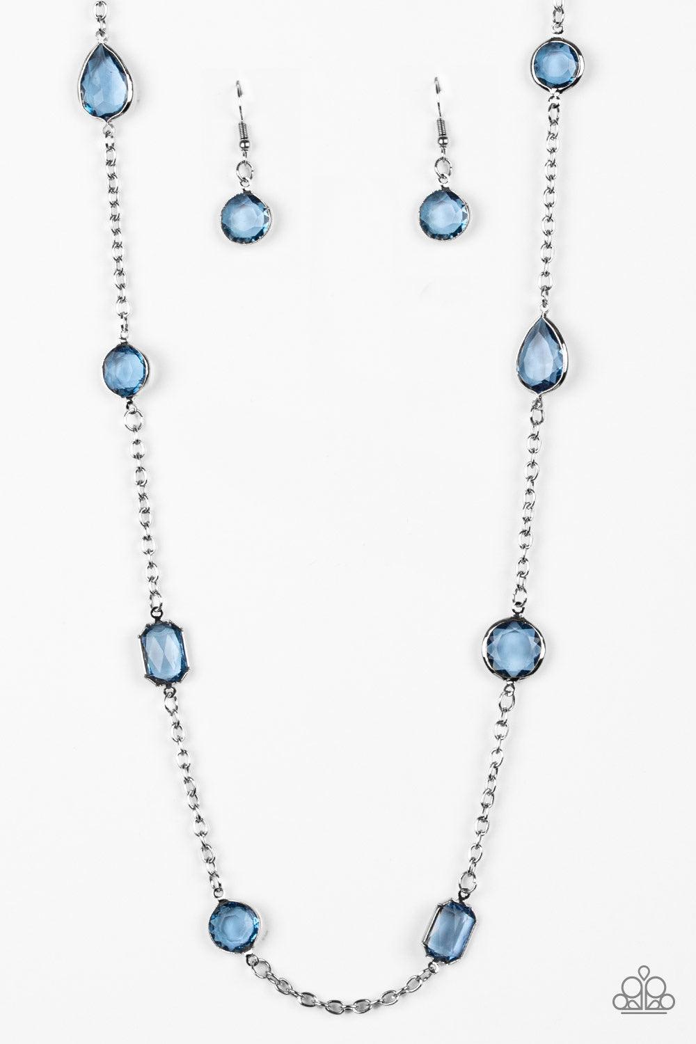 Paparazzi Accessories Glassy Glamorous - Blue Featuring sleek silver fittings, an array of glassy Blue Depths gemstones trickle along a shimmery silver chain for a glamorous look. Features an adjustable clasp closure. Sold as one individual necklace. Incl
